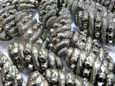 Пуговицы Овальные плетение серебро уп. 25 шт.
